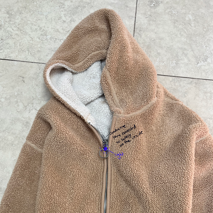Added a light to a zipper so it lights up when it's fully zipped