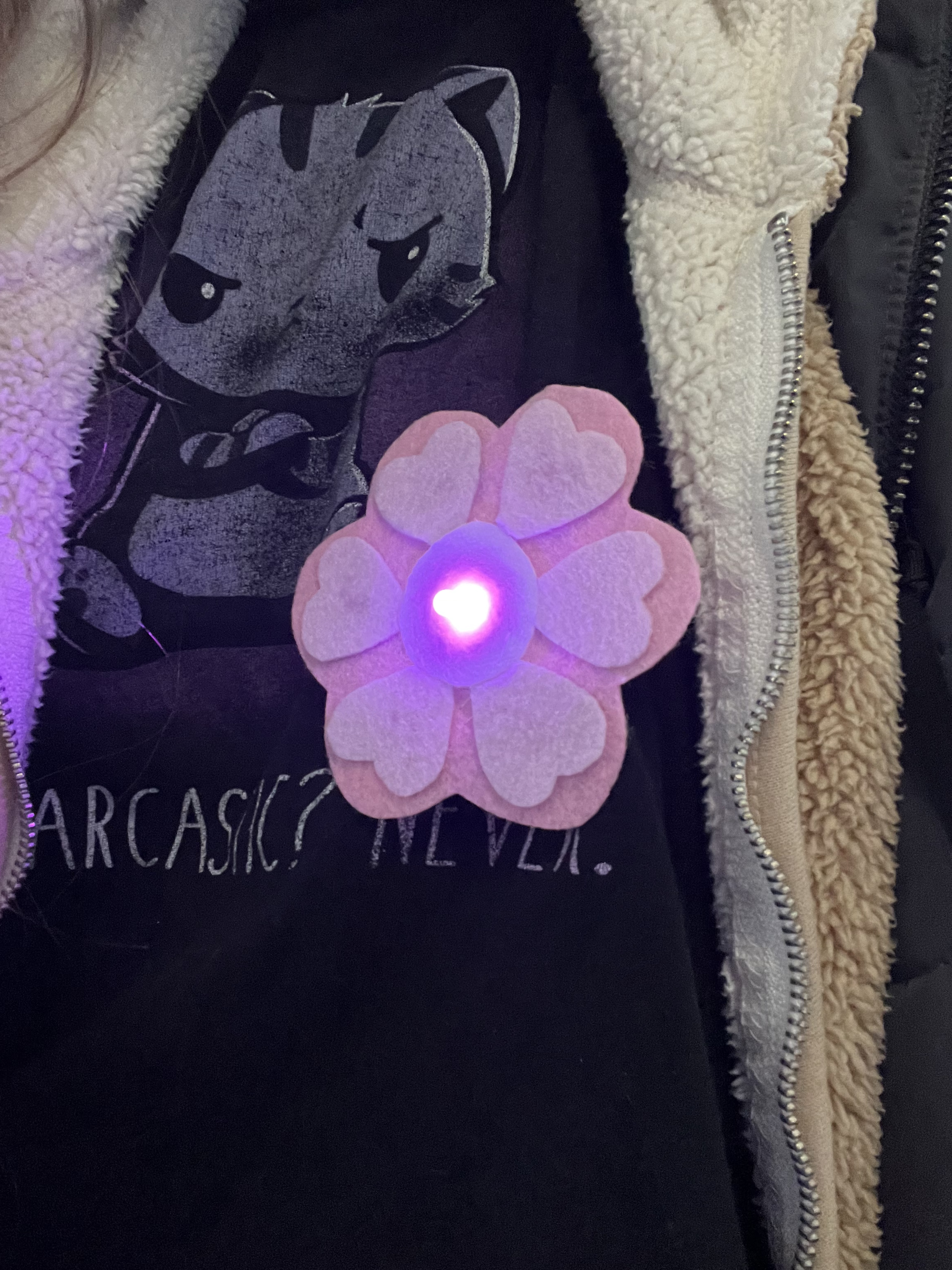 My final wearable design is a flower brooch that lights up when it is worn.