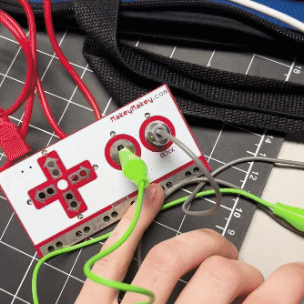 I added a second button that has a different affect on the P5 code when touched.